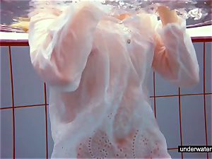 cute ginger-haired plays nude underwater