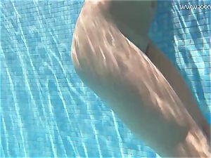 Jessica Lincoln small tattooed Russian nubile in the pool